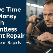 A technician performs paintless dent repair on a car panel inside a shop, with bold text reading “Save Time & Money with Paintless Dent Repair in Coon Rapids” on a blue background.