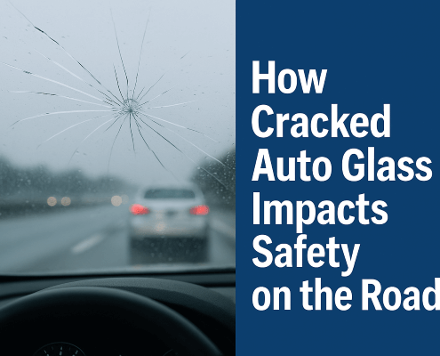 Driver’s view through a cracked windshield on a rainy highway, with blurred cars ahead and bold text on the right reading “How Cracked Auto Glass Impacts Safety on the Road.”