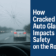 Driver’s view through a cracked windshield on a rainy highway, with blurred cars ahead and bold text on the right reading “How Cracked Auto Glass Impacts Safety on the Road.”