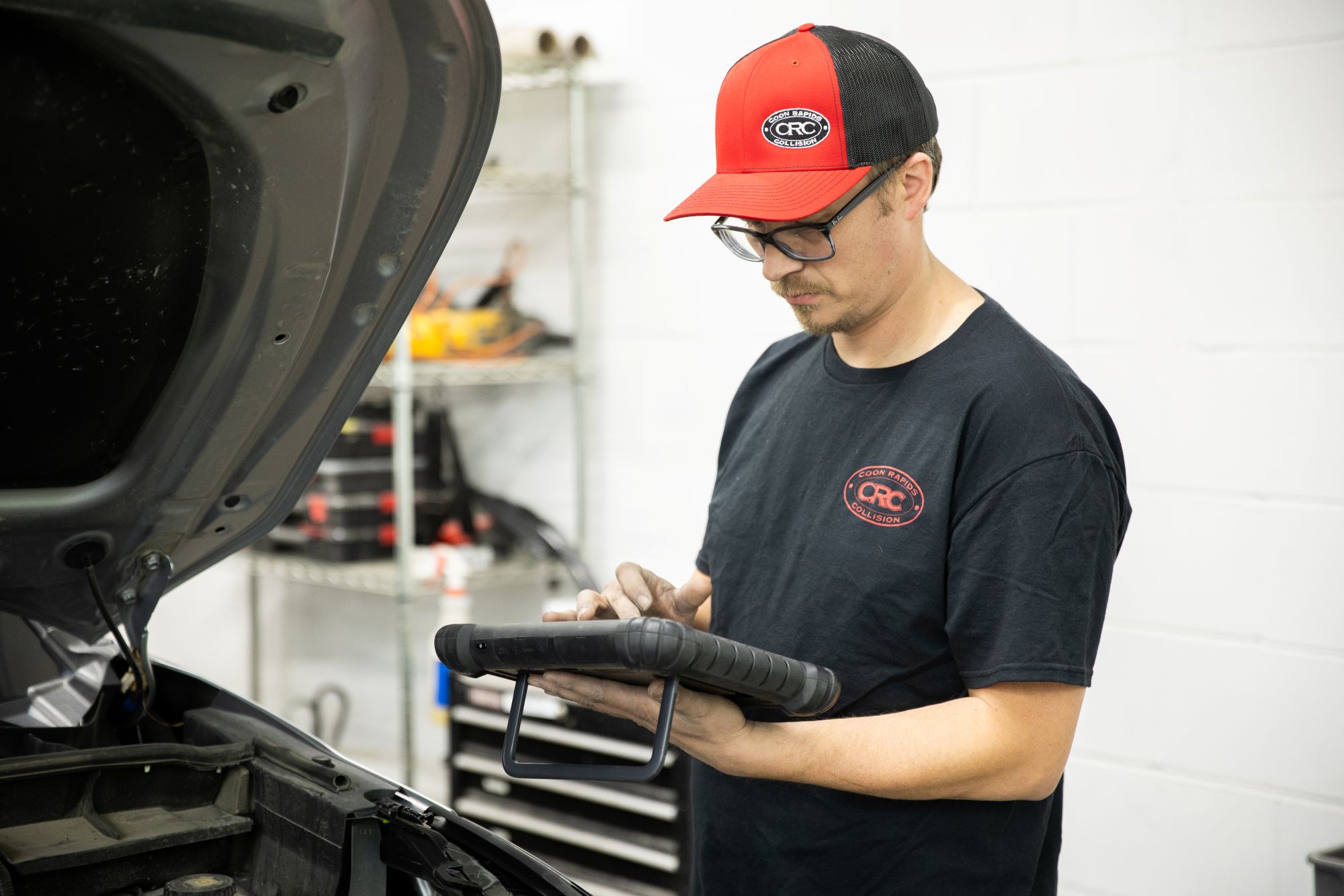 CRC Cole side view- Owner completing vehicle diagnostics CRC Cole side view- Owner completing vehicle diagnostics